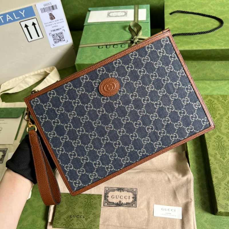 G*u*i clutch bags